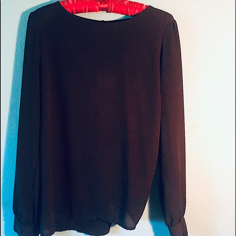 Sheer black top with back exposed